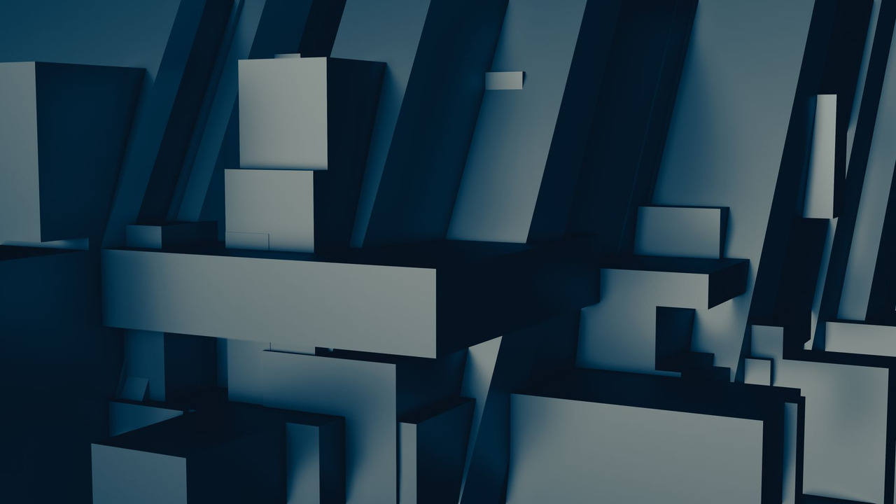 A creative abstract arrangement of geometric blocks in a monochrome palette, emphasizing form and structure.